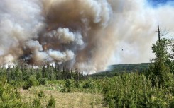This handout image provided by the BC Wildfire Service on June 7 shows smoke from the West Kiskatinaw River and Peavine Creek wildfires in the Dawson Creek Zone, British Colombia, Canada