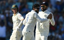 Success - India's Ravindra Jadeja (C) celebratess his dismissal of Australia's Travis Head in the World Test Championship final at The Oval