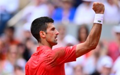 Record breaker: Novak Djokovic celebrates a point against Casper Ruud
