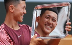Look of a champion: Japan's Tokito Oda celebrates 