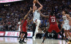 Nikola Jokic drives to the basket as Denver clinch their first NBA championship in history