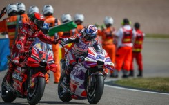 'Pecco' Bagnaia (left) congratulates German sprint winner Jorge Martin