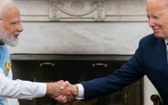 US President Joe Biden shakes hands with India's Prime Minister Narendra Modi in the Oval Office of the White House 