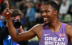 Britain's Zharnel Hughes broke the British men's 100m record set in 1993 by Linford Christie to win at the New York Grand Prix athletics meet