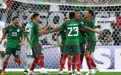 Luis Romo celebrates his second goal as Mexico crushed Honduras 4-0 in the CONCACAF Gold Cup group B in Houston on Sunday