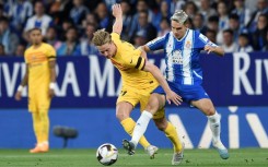 Denis Suarez (R) played on loan at Espanyol last season from Celta but has now signed for Villarreal