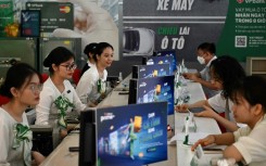Vietnam's economic growth slowed in the first half of the year as a slump in demand hit exports