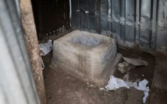 Thousands of schools in South Africa have open toilets like this -- essentially deep holes filled with human waste