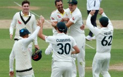 Australia celebrate the wicket of England's Harry Brook in the second Ashes Test at Lord's