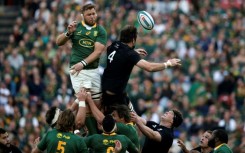 Springbok Duane Vermeulen (L) and All Black Sam Whitelock (R) compete for the ball in a lineout during a 2022 Rugby Championship match