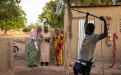 It takes a village: Actors (from left) Rasmane Ouedraogo, Ildevert Meda and Aminata Diallo-Glez on the set of 'Welcome to Kikideni'