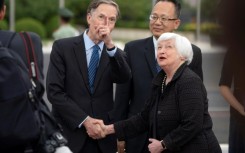 The four-day trip to China by Janet Yellen (R) is her first as US Treasury Secretary