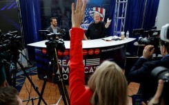 Steve Bannon (R), former advisor to former US president Donald Trump, hosts his War Room podcast live during the Conservative Political Action Conference on March 2, 2023 in National Harbor, Maryland