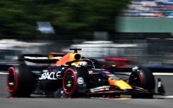 Red Bull's Dutch driver Max Verstappen and team-mate Sergio Perez dominated opening practice for the British Grand Prix