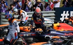Max Verstappen (right) edges out McLaren duo Lando Norris and Oscar Piastri for pole at Silverstone 