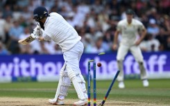 England's Moeen Ali is bowled for five by Australia's Mitchell Starc