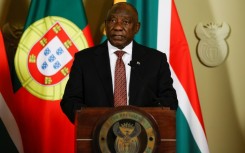 South African President Cyril Ramaphosa did not say if President Vladimir Putin -- wanted by the International Criminal Court (ICC) over accusations that Russia unlawfully deported Ukrainian children -- would attend next month's BRICS summit or not