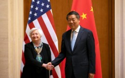 US Treasury Secretary Janet Yellen (L) shakes hands with Chinese Vice Premier He Lifeng during a a visit to Beijing