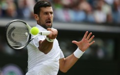 Power-packed: Novak Djokovic returns the ball to Hubert Hurkacz