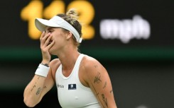 Marketa Vondrousova reacts after beating Jessica Pegula to reach the Wimbledon semi-finals