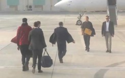 US basketball star Brittney Griner (L) was released in December by Russians in Abu Dhabi in exchange for Russian arms dealer Viktor Bout (2ndR), who had been imprisoned by the United States