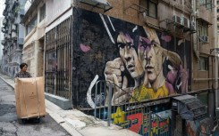 A Hong Kong mural pays tribute to Bruce Lee, whose films spawned a kung fu craze around the world