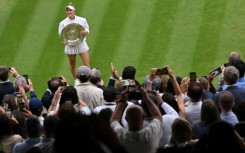 Marketa Vondrousova became the first unseeded woman to win Wimbledon