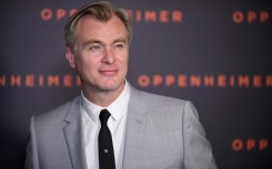 Christopher Nolan says the story of the invention of the atomic bomb told in his new film "Oppenheimer" is a warning to the world as we grapple with artificial intelligence