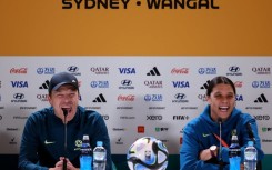 Australian coach Tony Gustavsson (L) and captain Sam Kerr were all smiles at their pre-match press conference