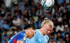 Manchester City forward Erling Haaland scored twice in Tokyo