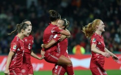 Denmark players celebrate their winner