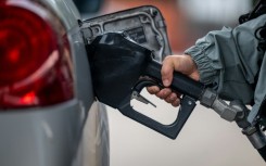ExxonMobil and Chevron reported lower but still lofty profits as commodity prices moderated compared with the year-ago period 