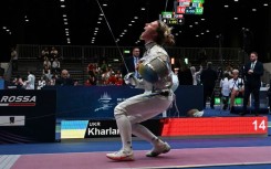 Ukraine's Olha Kharlan celebrates defeating Russia's Anna Smirnova (not in picture), registered as an Individual Neutral Athlete (AIN), during the Sabre Women's Senior Individual qualifiers, as part of the FIE Fencing World Championships at the Fair Allianz MI.CO (Milano Convegni) in Milan, on July 27, 2023.