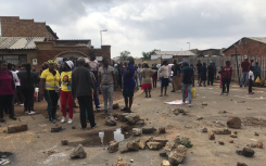 Community members demonstrating in Naledi, Soweto over service delivery issues.