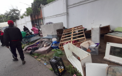 People being evicted from a property in Bompas Road, Dunkeld West.