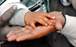 File: Fathers of newborns can look forward to spending a bit more time with their babies.