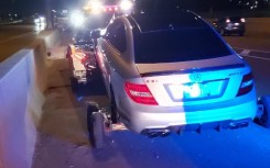 The driver, accompanied by another man his age, was driving his father's Mercedes late Saturday night on the Queen Elizabeth Way highway.