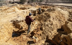 Zama zamas mine for gold at a mining operation in Stormill where violent territorial battles have wreaked havoc. AFP/Shiraaz Mohamed