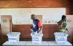A man casts his vote at a polling station during Zimbabwe's presidential and legislative elections. AFP/Zinyange Auntony