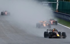 Rain men: Max Verstappen drives during the formation lap for the sprint race at the Belgian Grand Prix on Saturday 