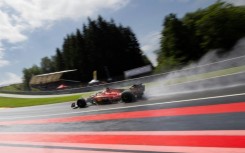 Rain man: Ferrari's Charles Leclerc competes during the sprint shootout at the Belgian Grand Prix