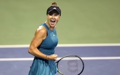 Elina Svitolina of Ukraine celebrates victory over Victoria Azarenka at the WTA Tour's Mubadala Citi DC Open