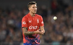 England's Brydon Carse prepares to bowl. AFP/Oli Scarff