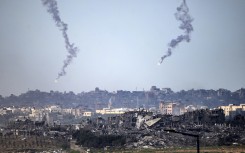 Flares launched by the Israeli army over the Palestinian territory amid ongoing battles between Israel and the Palestinian Hamas movement. AFP/John MacDougall