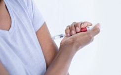 File: A diabetes patient self-injecting. R3F/Science Photo Library via AFP