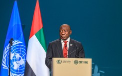 South Africa's President Matamela Cyril Ramaphosa speaks during the High-Level Segment for Heads of State and Government session at the United Nations climate summit in Dubai on December 1, 2023. 