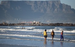 A view of Table Mountain, across Table Bay, from Bloubergstrand Beach, in Cape Town. 