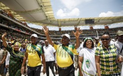 South African President and president of the African National Congress (ANC) Cyril Ramaphosa (C) and Deputy President of South Africa and the ANC Paul Mashatile (2nd L) arrive at the 112th ANC Anniversary rally in Mbombela on January 13, 2024. 