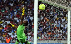 File: The late Orlando Pirates' goalkeeper Senzo Meyiwa in action against  Al-Ahly during the African Champions League first leg final between South Africa's Orlando Pirates and Egypt's Al-Ahly in Soweto on November 2, 2013. 