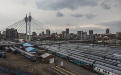 File: An aerial view in Johannesburg shows the Mandela bridge in Braamfontein and the Park Station train depot.